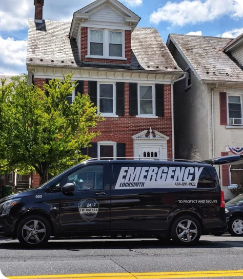 24/7 Emergency Locksmith van parked outside a Bethlehem row home